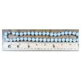 knotted Pearl necklace, very very light gray