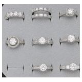 8pc sterling rings with marked CZ stones,