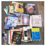 sheet music and music lesson books