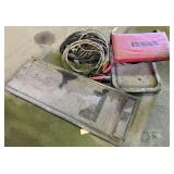 creeper, mechanics stool, jumper cables