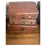 3 old suitcases