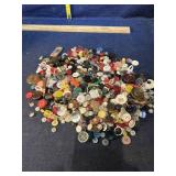 Buttons, careful of loose needles or pins