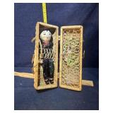 Chinese Doll in Wicker carrier