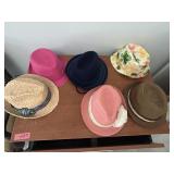 Ladies hats appear to be 7ish