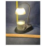 Candle and warming bulb