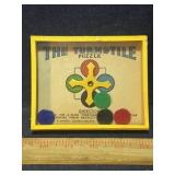 The Turnstyle puzzle dexterity game, made in Engla