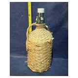 Wicker lined Bacardi bottle