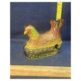 Tin litho hen on nest