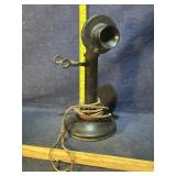 Antique telephone, missing the ear piece