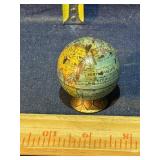 Pencil sharpener shaped like a globe