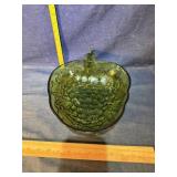 Green glass bowl, shaped like an apple?