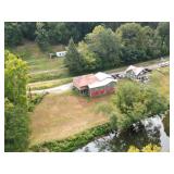 Business Opportunity: Multi-Use Building w/ Elk River Frontage in Clay County