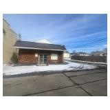 Income Producing Commercial Building with Apartments in South Charleston