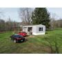Over 1 Acre with Mobile Home on the Little Kanawha River 