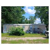 Riverfront Investment Opportunity ncome Generating Mobile Home in St. Albans