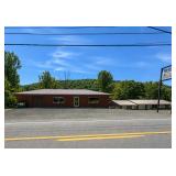 Riverfront Commercial Property with Parking & Extra Lot in Clendenin