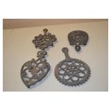 Lot of 4 Cast Iron Trivets