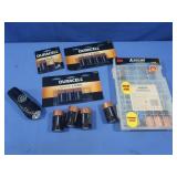 Batteries, various sizes & Handheld Flashlight
