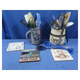 Kitchen utensils in ceramic jars