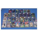 Assorted Football Cards in Top Loaders