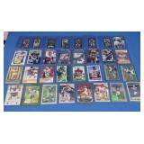 Assorted Football Cards in Top Loaders