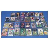 Assorted Football Cards in Top Loaders
