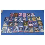Assorted Baseball Cards in Top Loaders