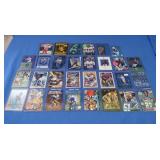 Assorted Football Cards in Top Loaders
