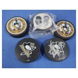 5 NHL Penguins Hockey Pucks,1 signed by Jordan