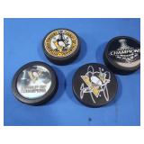 4 NHL Penguins Hockey Pucks,1 signed(Maybe Jagr)