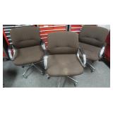 3 Swivel, wheeled, cushioned arm chairs