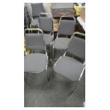 4 Cushioned metal chairs