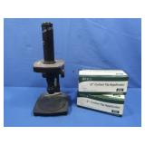 Microscope, missing eyepiece, sterile cotton tip