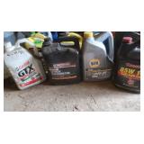 4 Partial Jugs of Mtoro OIl&Transmission Fluid