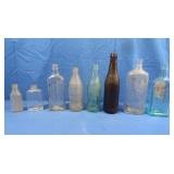 7 Antique Bottles incl 1 Coca-Cola Bottle