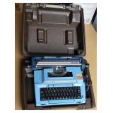 Retro Smith Corona blue electric typewriter