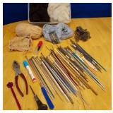 Wool fleece, yarns, knitting needles, etc