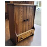 Press carved doll cupboard