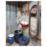 Pile of junque hose, cooler, chicken waters, etc
