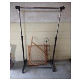 Wooden gate, clothes rack