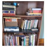 Books on bottom 3 rows of bookshelf - upstairs