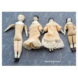4 tiny bisque dolls