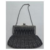 Mesh beaded purse with green satin lining