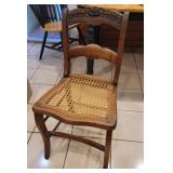 Cane seat Victorian rose carved chair