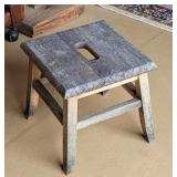 Stool with hand grab