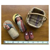 Skookum babies & slippers in a basket