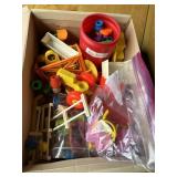 Shoebox of Fisher Price accessories
