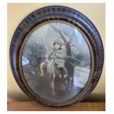 Pastel photo of a boy on pony in oval bowed glass