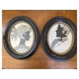 2 oval framed silhouettes