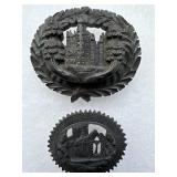 2 Vulcanite brooches